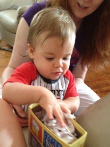 Marcello saw so much packing that he suddenly decided to pack a box of his own.