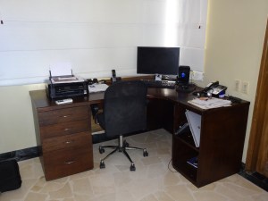 Gio's custom-made desk. A good fit... for the space and our budget!